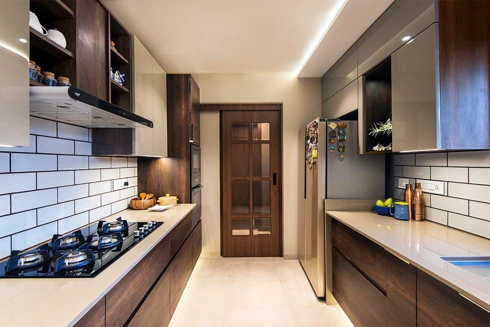 Modern parallel kitchen design with wooden interiors - Beautiful Homes